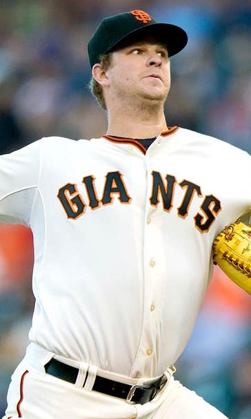 Giants' Cain may be a spectator, but he's not standing idly by